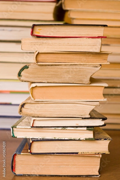 Fototapeta stack of old books at public  library