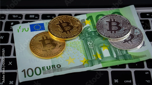 Fototapeta Bitcoin currency and computer keyboard