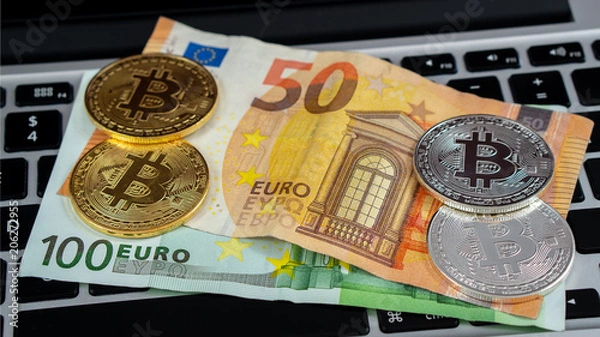 Fototapeta Bitcoin currency and computer keyboard