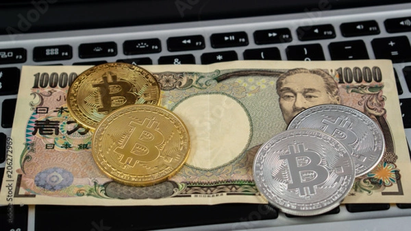 Fototapeta Bitcoin currency and computer keyboard