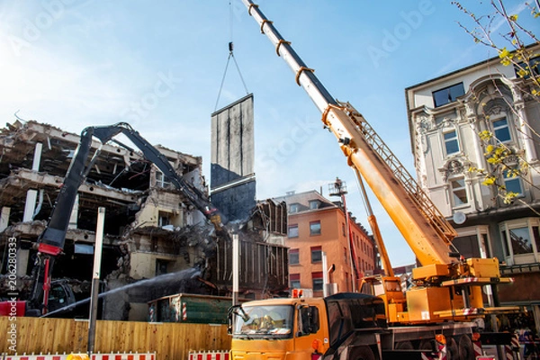 Obraz Orange Crane and demolition bulldozer