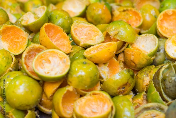 Fototapeta Close up of orange fruits after make orange juice.