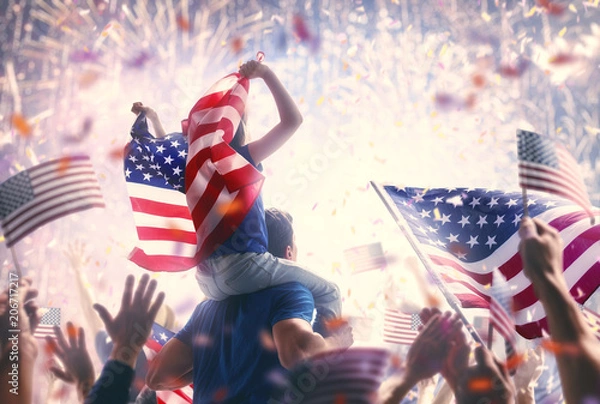 Obraz Ludzie posiadający flagi USA.