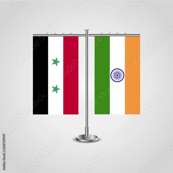 Obraz Table stand with flags of Syria and India.Two flag. Flag pole. Symbolizing the cooperation between the two countries. Table flags