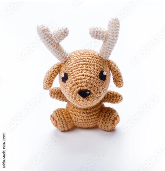 Obraz Knitted toy isolated on white background