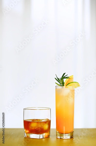 Fototapeta A single Whiskey and Paloma Cocktail on the center of copper counter top, in front of a defocused window with white plain curtain, without decoration, simple background, ambient nature day lighting 3