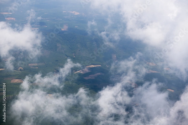 Fototapeta landscape look down from the airplane look see the sky and cloud beautiful