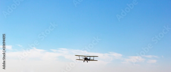 Fototapeta Day of the Air Fleet. Biplane in the sky, in the air