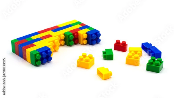 Fototapeta Plastic building blocks isolated on white background