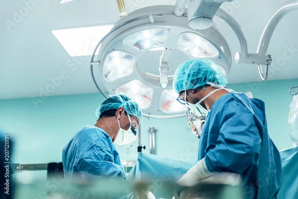 Fototapeta Team of Surgeons Operating in the Hospital.