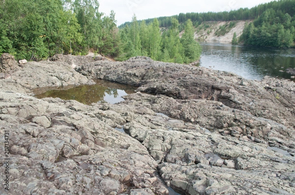 Obraz rocky riverbed and ancient extinct volcano and geyser in Karelia