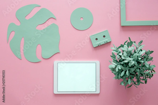 Fototapeta Tablet against pink background