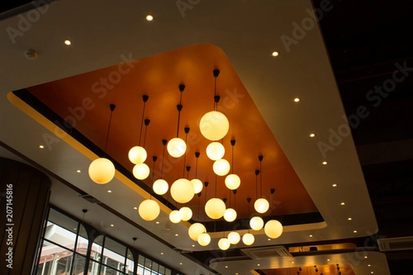 Fototapeta professional lighting for interior design ball lights hanging from ceiling