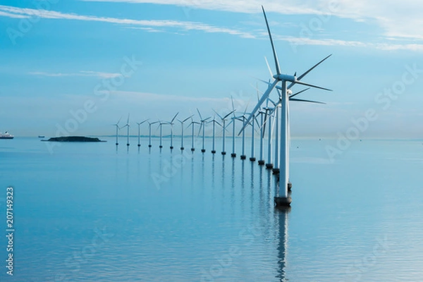 Fototapeta windmills in the sea with reflection