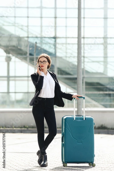 Obraz . Business woman at international airport moving to terminal gate for airplane travel trip - Mobility concept and aerospace industry flight connections
