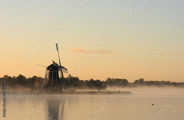 Fototapeta Foggy Dutch windmill