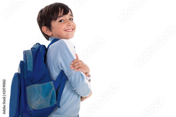 Obraz Happy young boy ready for school with his bag