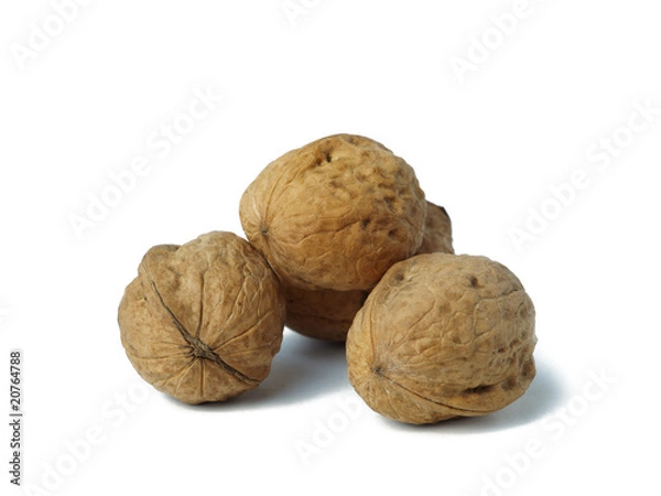 Fototapeta Walnuts on white background