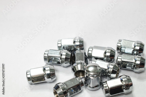 Obraz Car service, nut of fixture of a wheel of the car on a white background,