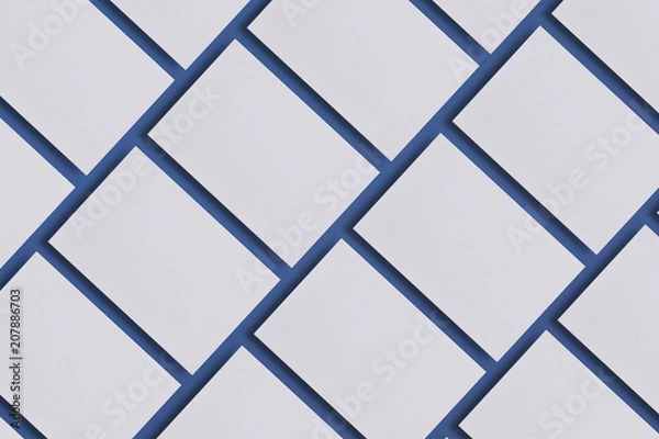 Obraz Photo of blank business cards. Mock-up for branding identity. For graphic designers presentations and portfolios. Business cards stacks arranged in rows on blue textured paper background
