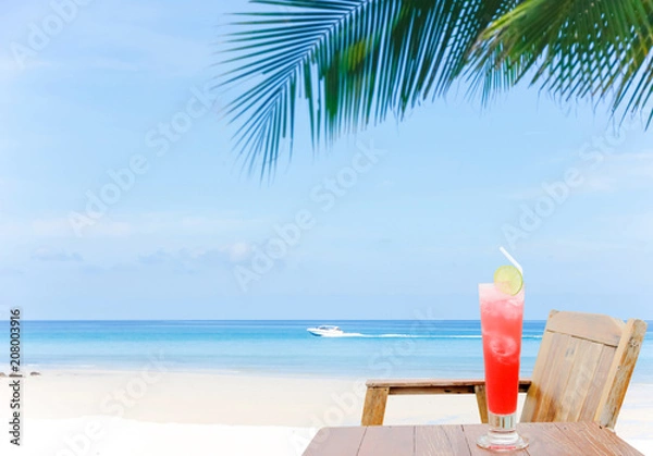 Obraz cocktail with a heavenly view on paradise island.Sand beach and Beautiful sea background in summer.