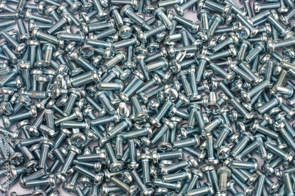 Fototapeta Screws as background, top view
