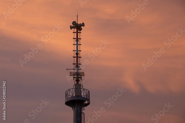 Obraz Warning pole and evening sky.
