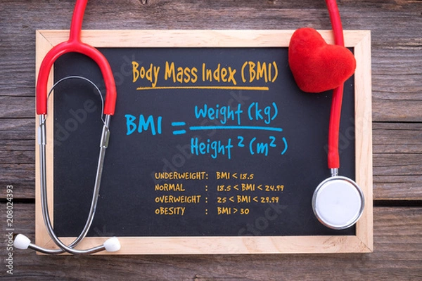 Fototapeta Body Mass Index formula on chalkboard, health concepts