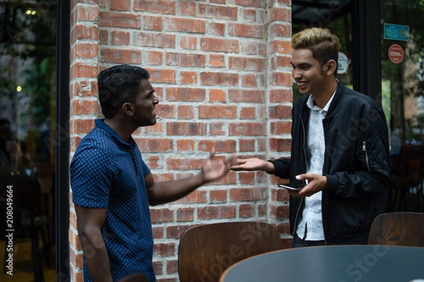 Obraz two mens communicating with each other