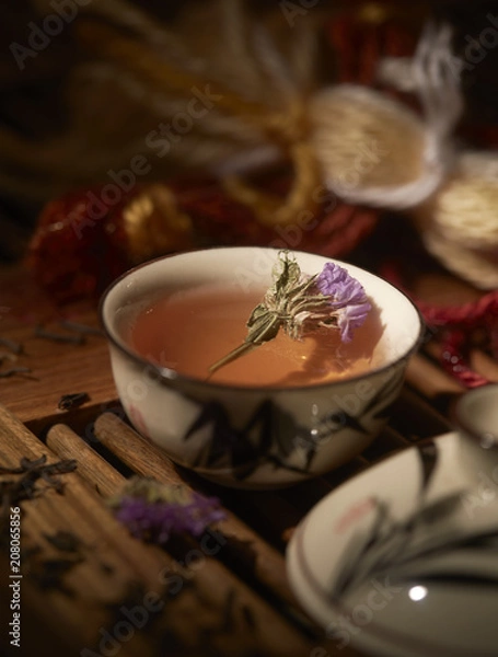 Fototapeta Piala with tea in Chinese style. Shallow depth of field,