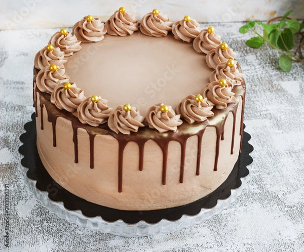 Obraz Chocolate Cake with Fudge Drizzled Icing and Curls