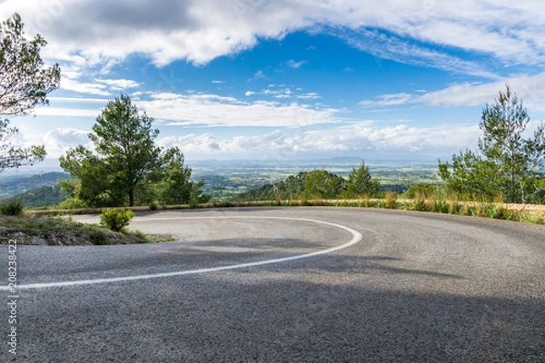 Obraz Mallorca, Road turn in mountainous landscape with clear views over nature fields