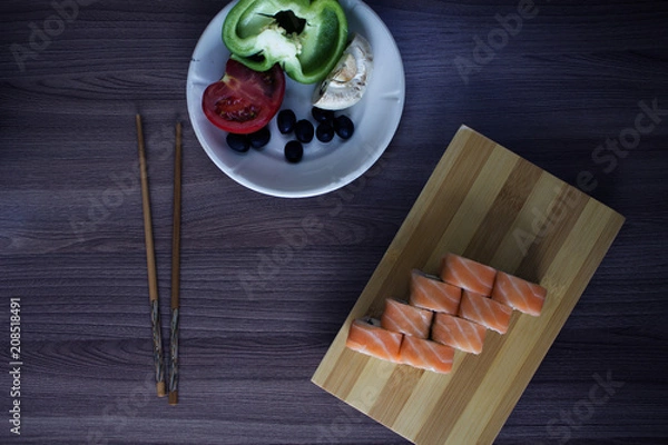 Obraz sushi rolls and vegetables