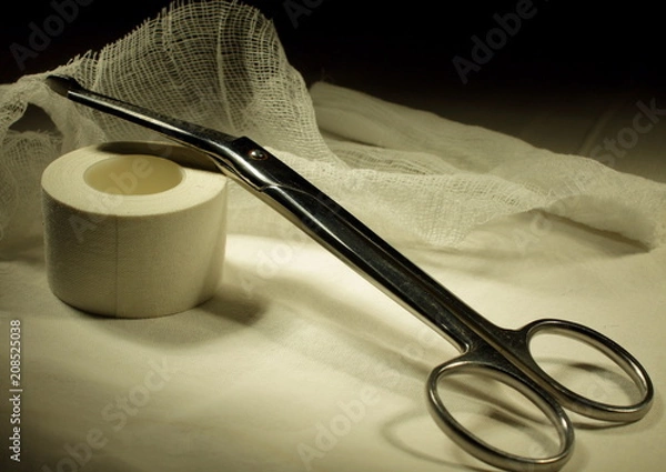 Obraz scissors, bandage and adhesive plaster
