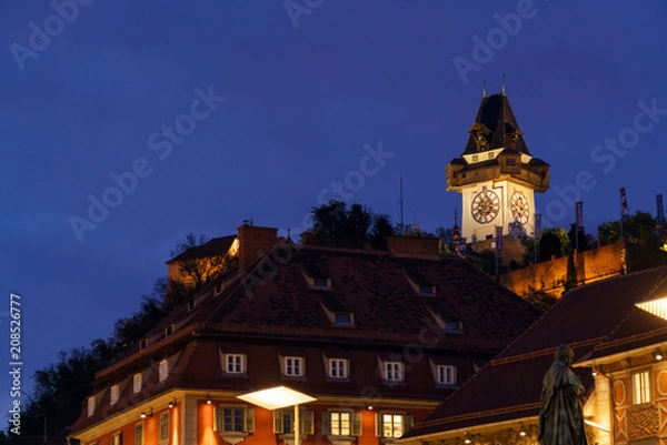 Obraz The Schlossberg or Castle Hill with the tower Uhrturm at night, Graz, Austria