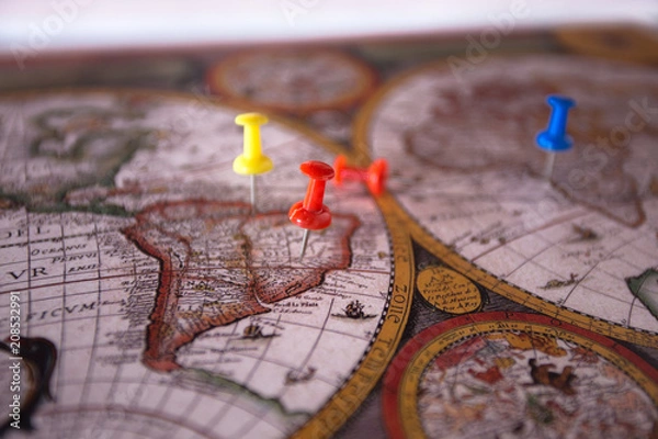 Obraz Colored Fasteners on World Map