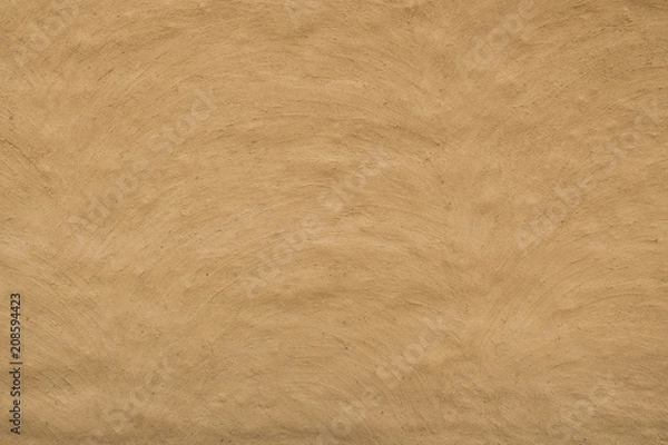 Fototapeta Closeup shot of a mud wall texture