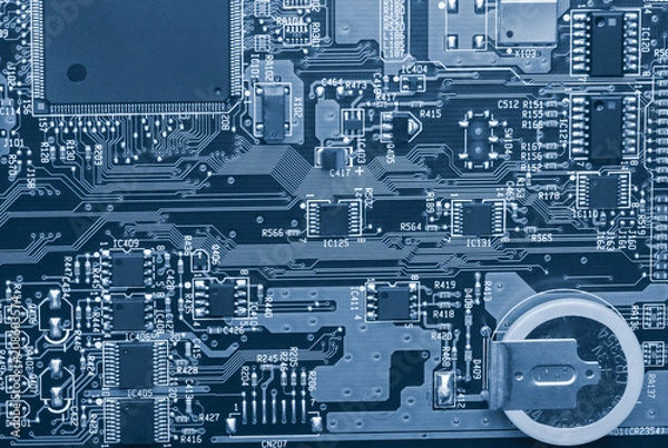 Obraz Electronic components are mounted on the device board Chips diodes capacitors chokes Close-up