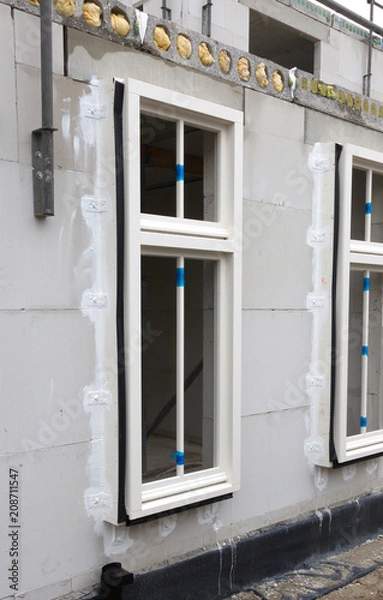 Fototapeta Building site with house under construction