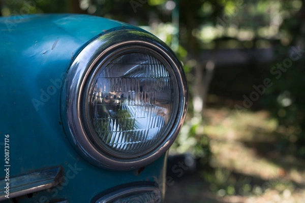 Obraz blue retro car headlight