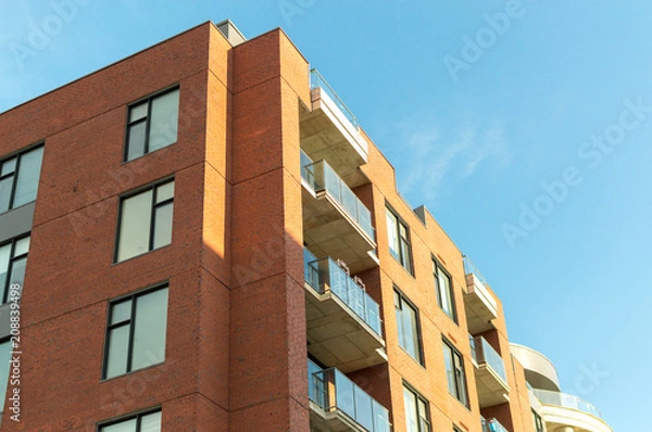 Fototapeta Modern condo buildings with huge windows and balconies in Montreal, Canada. 