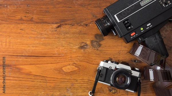 Fototapeta Vintage photo and video instruments on wood