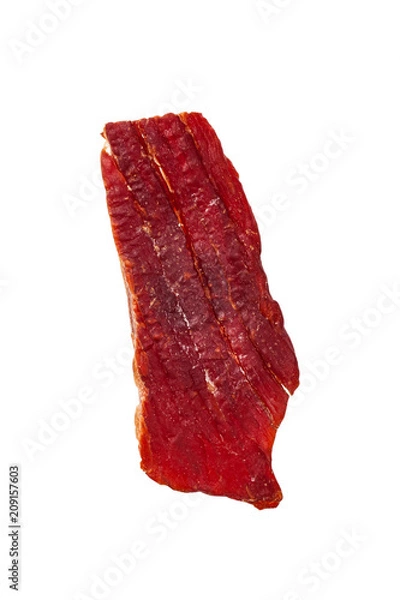 Fototapeta Beef Jerky Macro Isolated on White Background. Selective focus.