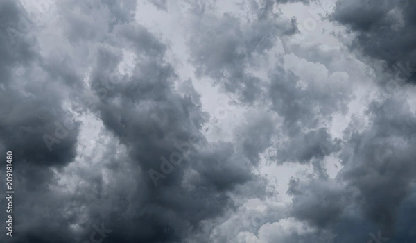 Fototapeta Dark storm clouds before rain used for climate background. Clouds become dark gray before raining. Dramatic background.