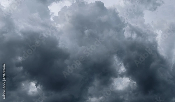 Fototapeta Dark storm clouds before rain used for climate background. Clouds become dark gray before raining. Dramatic background.