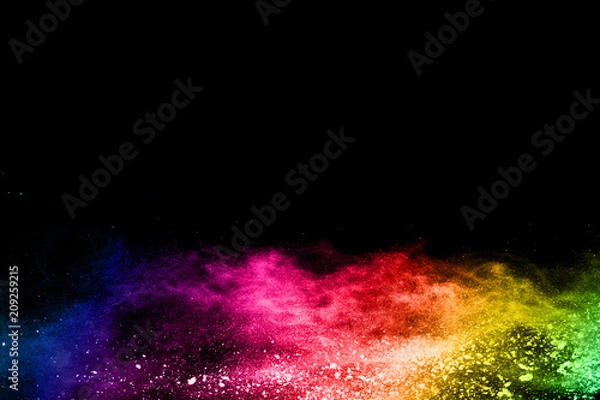 Obraz Multicolor powder explosion on black background. 