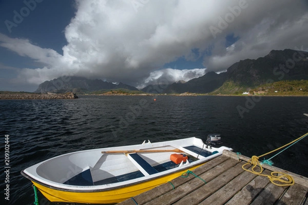 Obraz White boat on the shore with view to mountain and sea in the Norway at summer