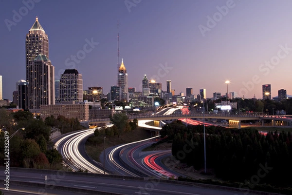 Obraz Atlanta skyline just before sunset with traffic streaks