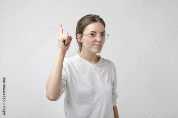 Obraz Young girlfriend has idea to solve problem.