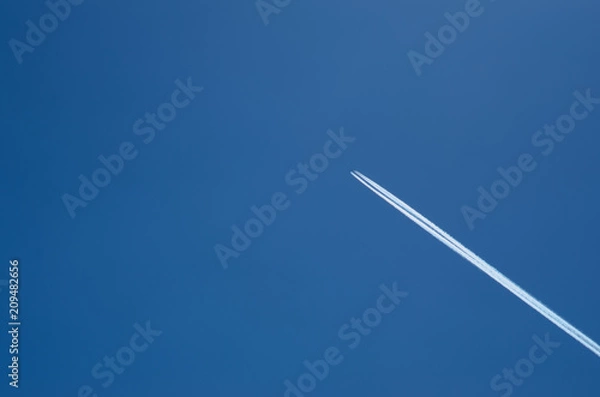 Obraz A lone plane in the sky